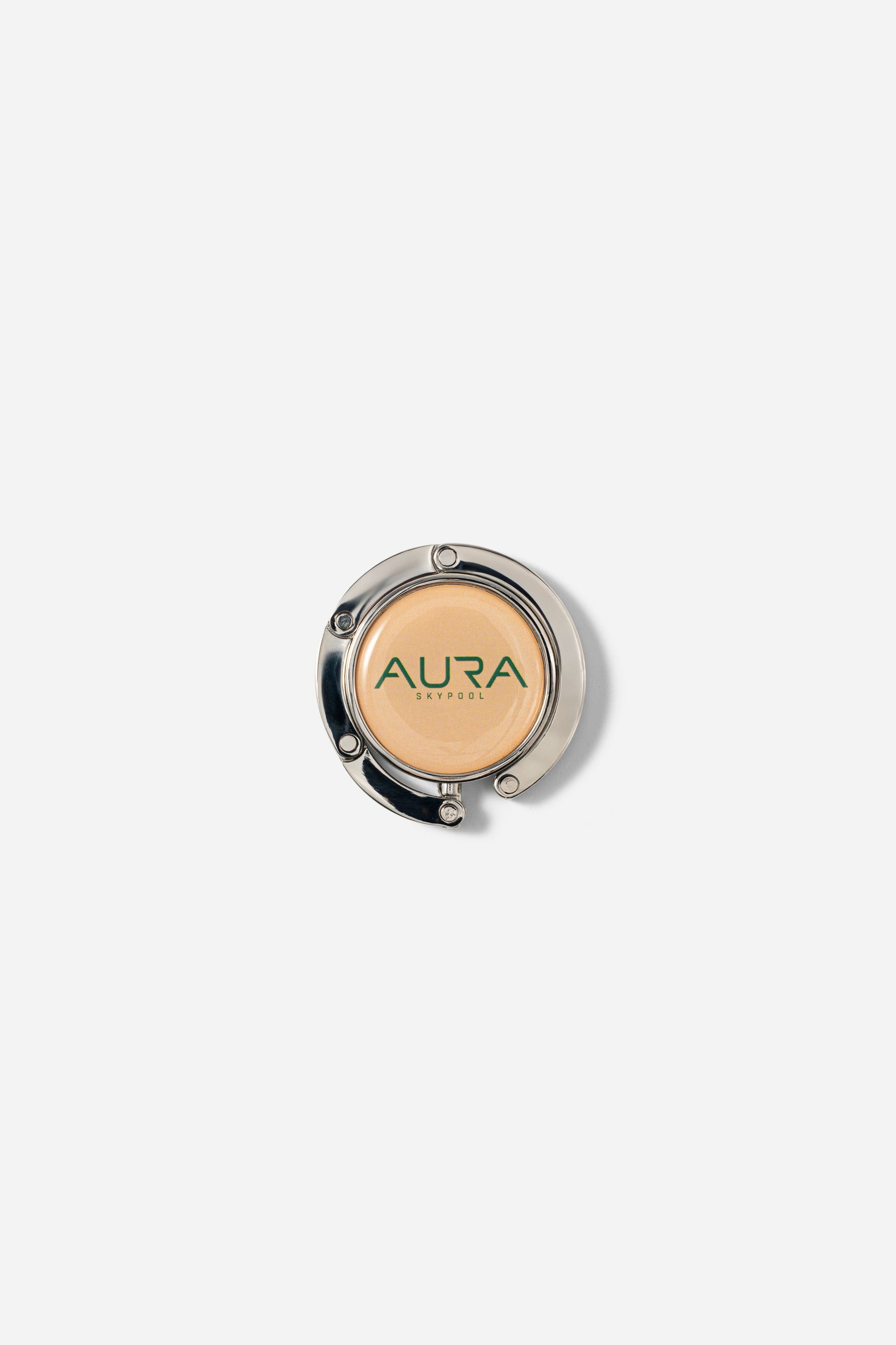 AURA Bag Hanger folded flat showing the AURA Skypool enamel disc