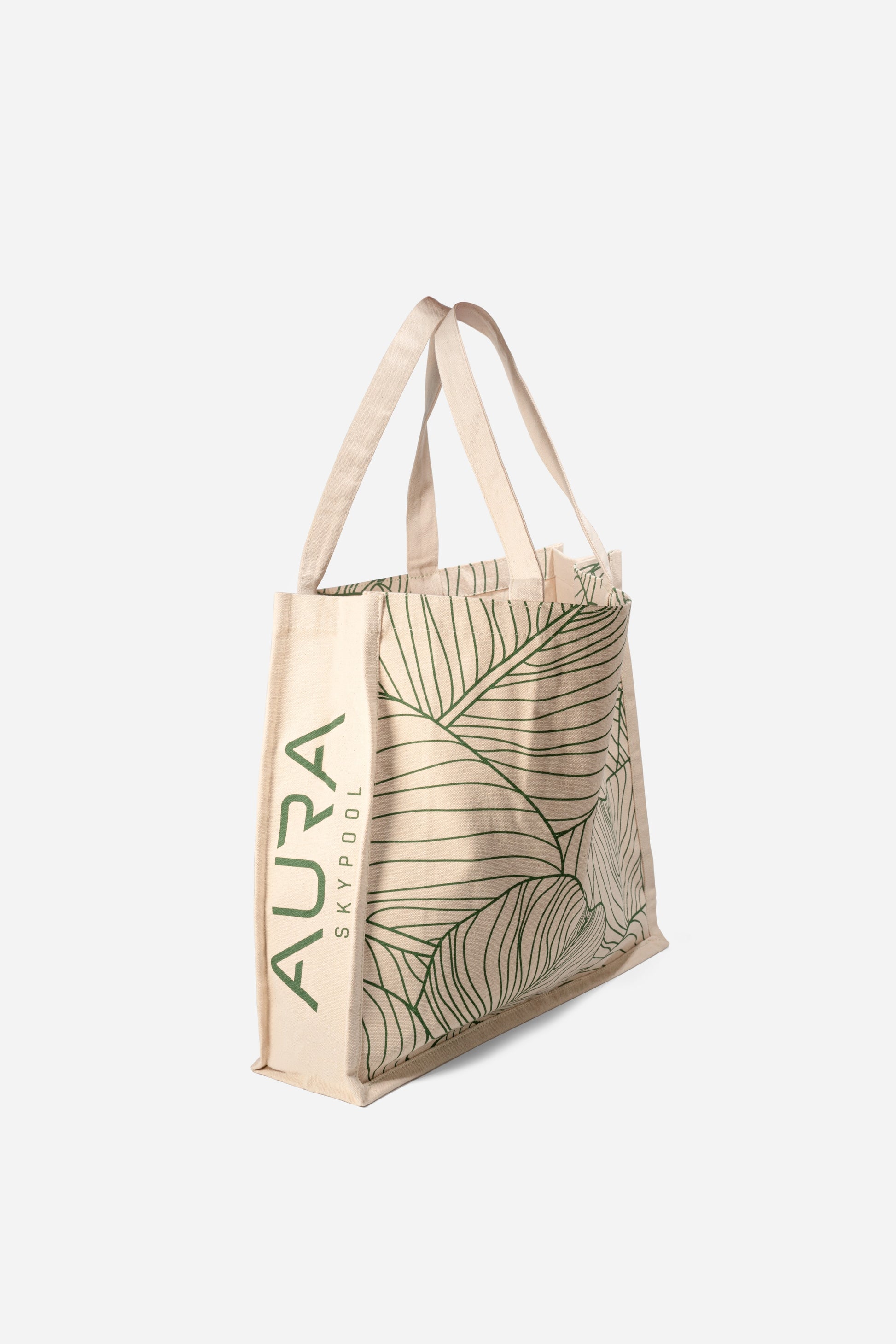 Side view of The AURA Canvas Tote showing AURA Skypool logo printed along the panel
