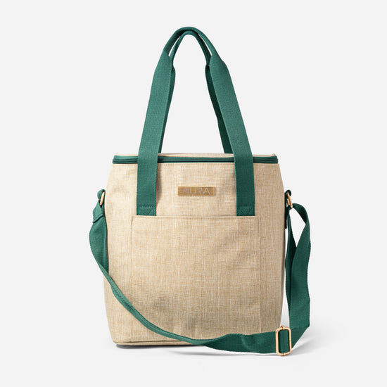 AURA Cooler Bag in beige canvas with green handles and adjustable crossbody strap, front view