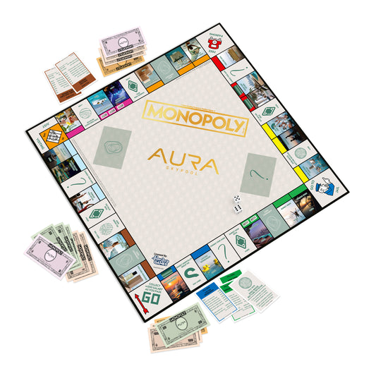 AURA Monopoly board laid out with custom cash, cards and dice