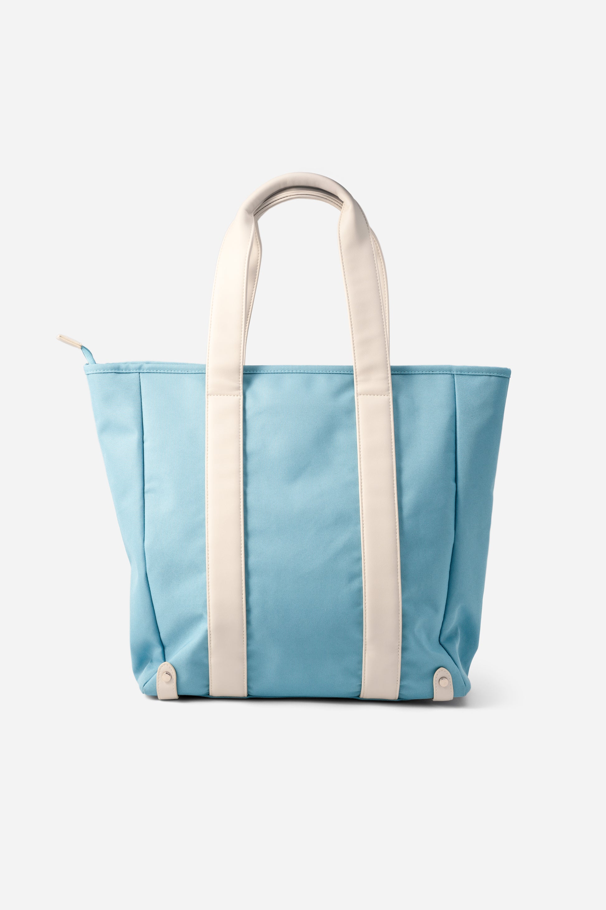 Back view of AURA Beach Bag Whisper Blue showing cream handles and side zip pull