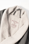 AURA Skypool care label on Cosy Robe, 100% nylon outside, 100% cotton inside, made in UAE