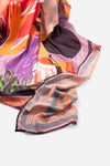 Dubai Skyline Sarong in coral, draped close-up, alternate print detail