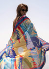Dubai Skyline Sarong in indigo, wrapped and wind-blown on a Dubai rooftop