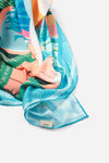 Dubai Skyline Sarong in sky blue, draped close-up, alternate print detail