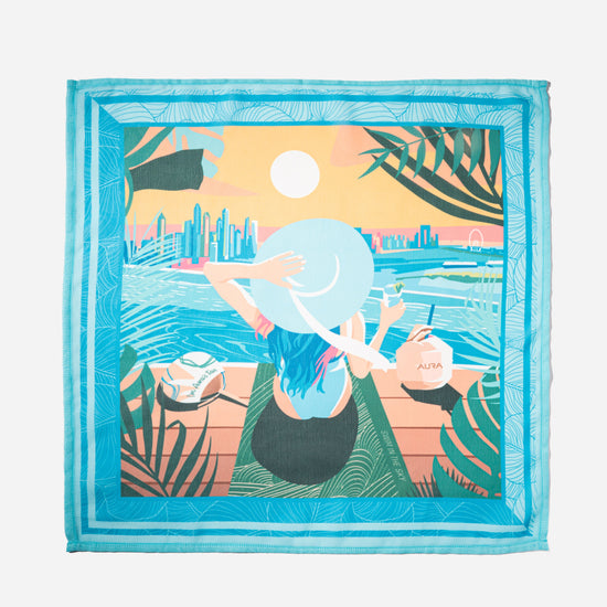 AURA Dubai Skyline Mini Scarf in Sky Blue, full flat lay of the illustrated skyline scene