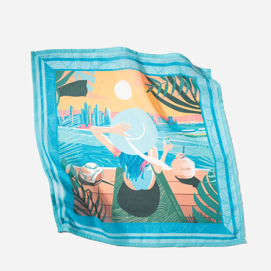 Dubai Skyline Mini Scarf in Sky Blue, lightly rumpled flat lay showing sheer chiffon