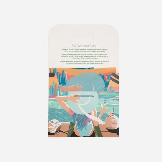 Dubai Skyline Mini Scarf in Sky Blue, packaging card with AURA Accent Scarf description