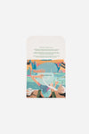 Dubai Skyline Mini Scarf in Sky Blue, packaging card with AURA Accent Scarf description