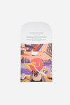 Dubai Skyline Silk Scarf in Coral, packaging card with AURA scarf description