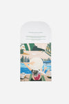 Dubai Skyline Silk Scarf in Green, packaging envelope with AURA scarf description