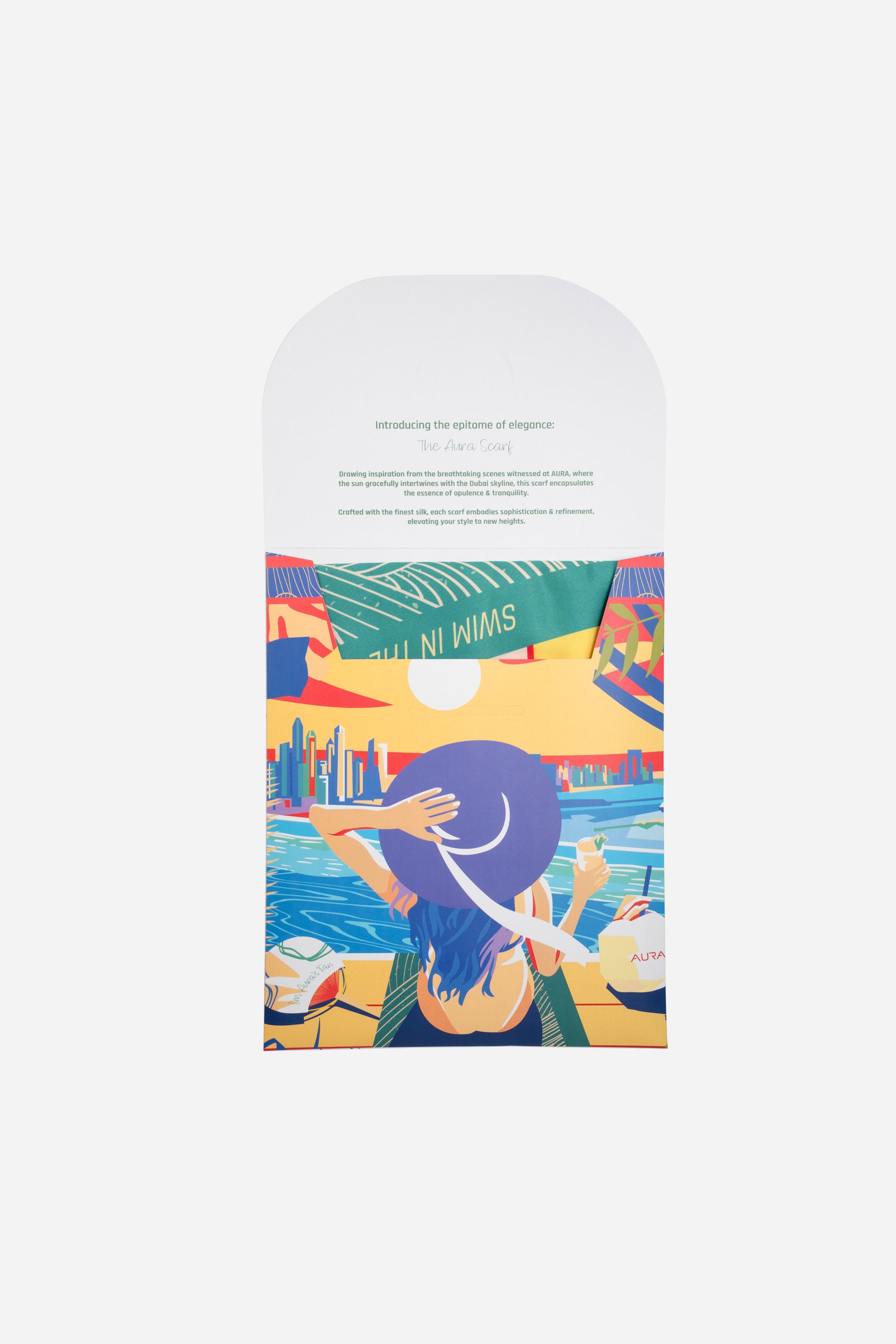Dubai Skyline Silk Scarf in Indigo, packaging envelope with AURA scarf description