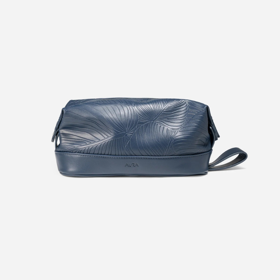 AURA wash bag in horizon blue leaf-embossed leather with wrist strap