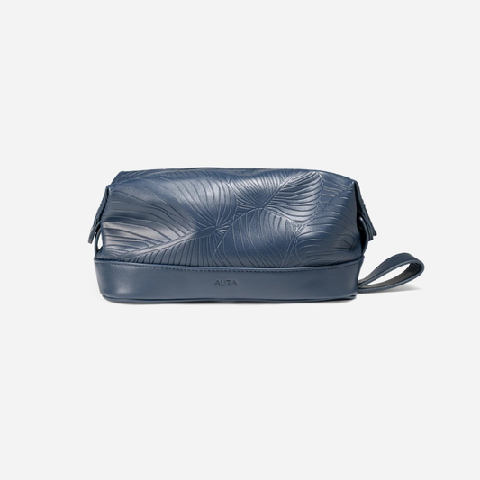 AURA wash bag in horizon blue leaf-embossed leather with wrist strap