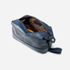 Wash bag horizon blue interior open showing rust geometric-print lining