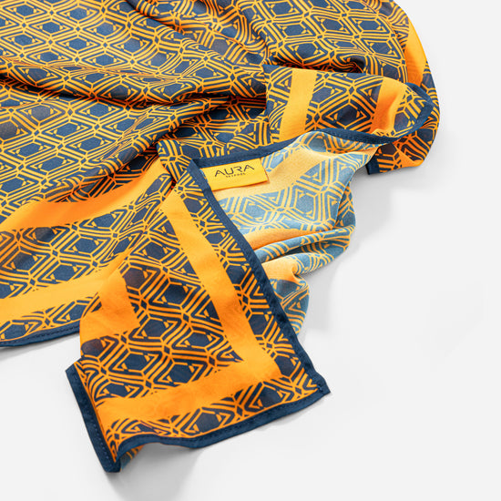 Monogram Sarong in Midnight Mirage, draped close-up with AURA label visible