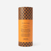 Monogram Sarong in Midnight Mirage, tube packaging back reading 'The AURA Sarong, The Monogram Collection'