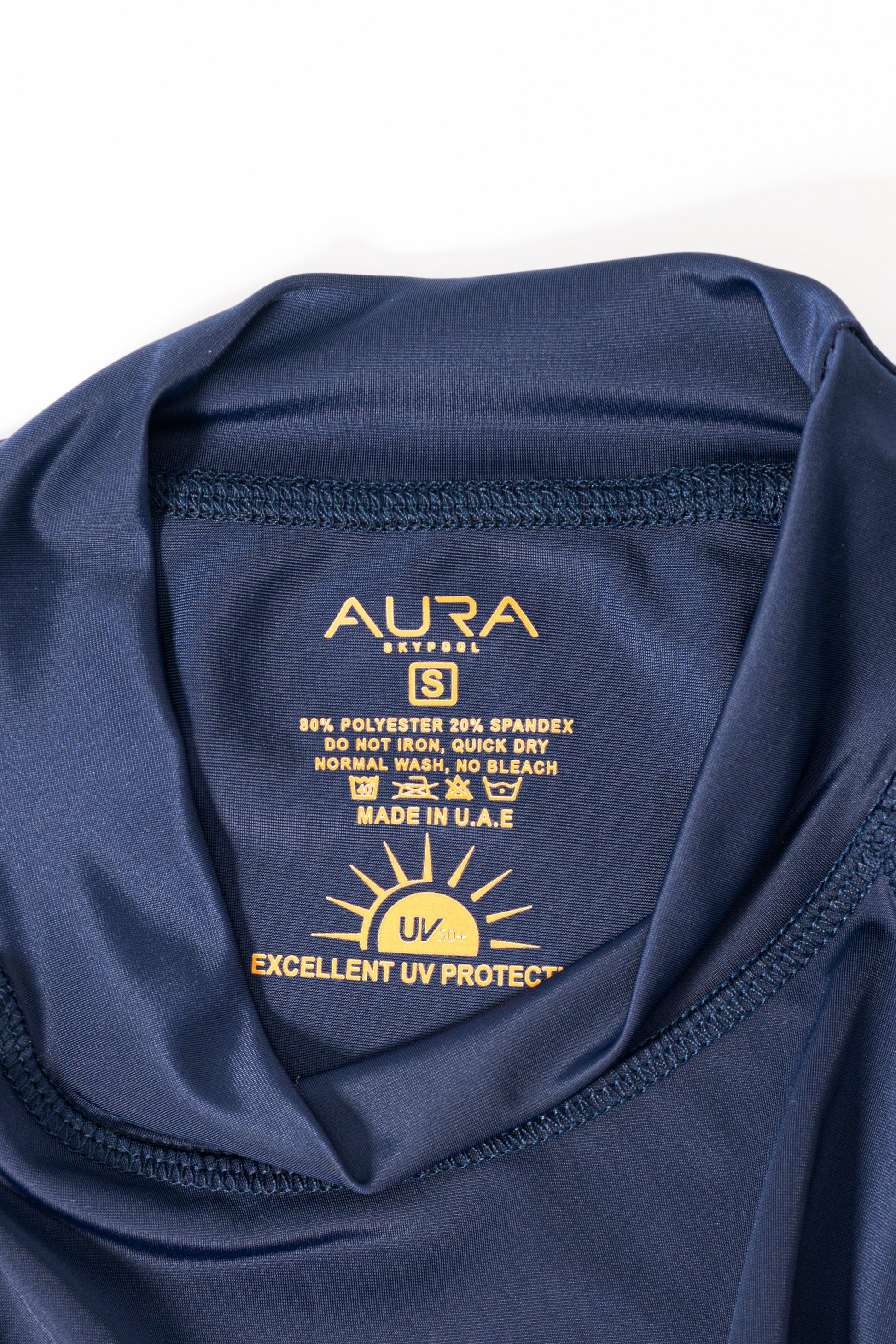 Monogram Burkini in Midnight Mirage, care label showing fabric and UV50+ protection