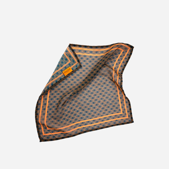 Monogram Mini Scarf in Midnight Mirage, bunched showing the AURA label and orange border