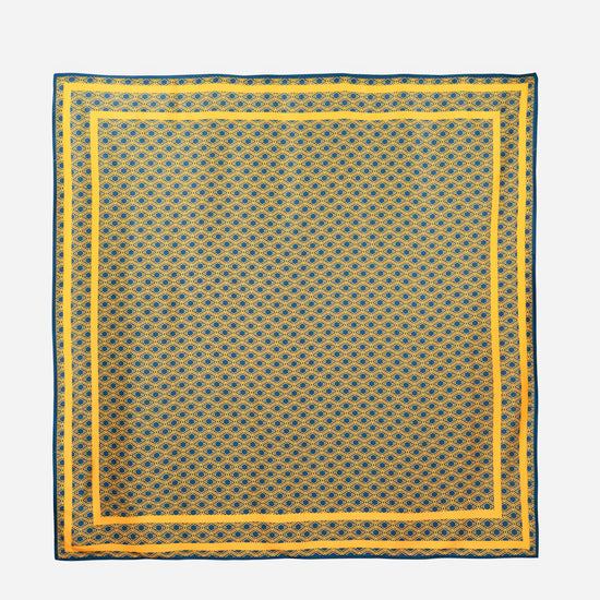 Monogram Silk Scarf in Midnight Mirage, full flat lay of the navy and gold diamond print