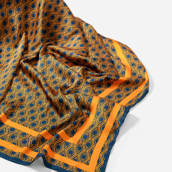 Monogram Silk Scarf in Midnight Mirage, bunched showing the reverse orange diamond print