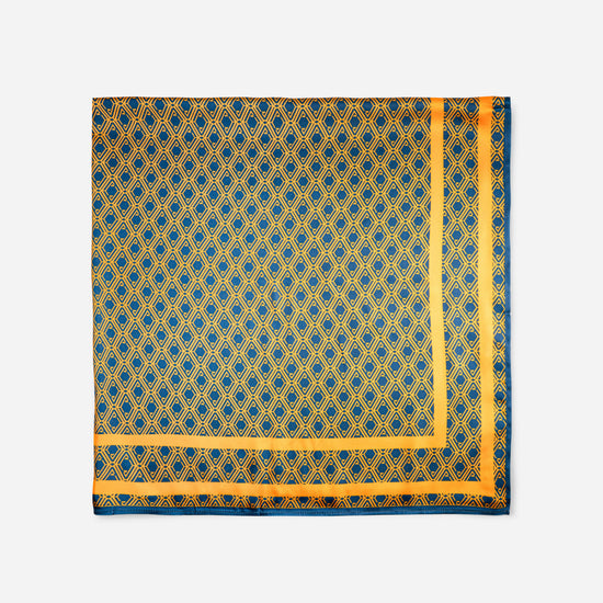 Monogram Silk Scarf in Midnight Mirage, cropped flat lay of the diamond print and gold border