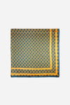 Monogram Silk Scarf in Midnight Mirage, cropped flat lay of the diamond print and gold border