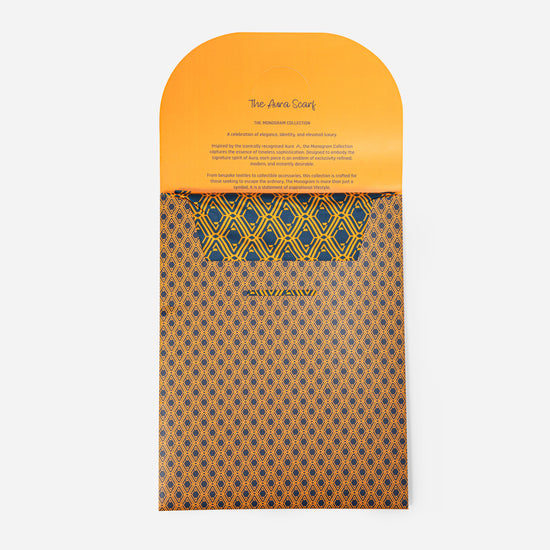 Monogram Silk Scarf in Midnight Mirage, packaging card with AURA scarf description