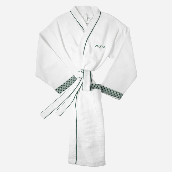 AURA Waffle Robe in white with evergreen monogram print cuffs and tie belt