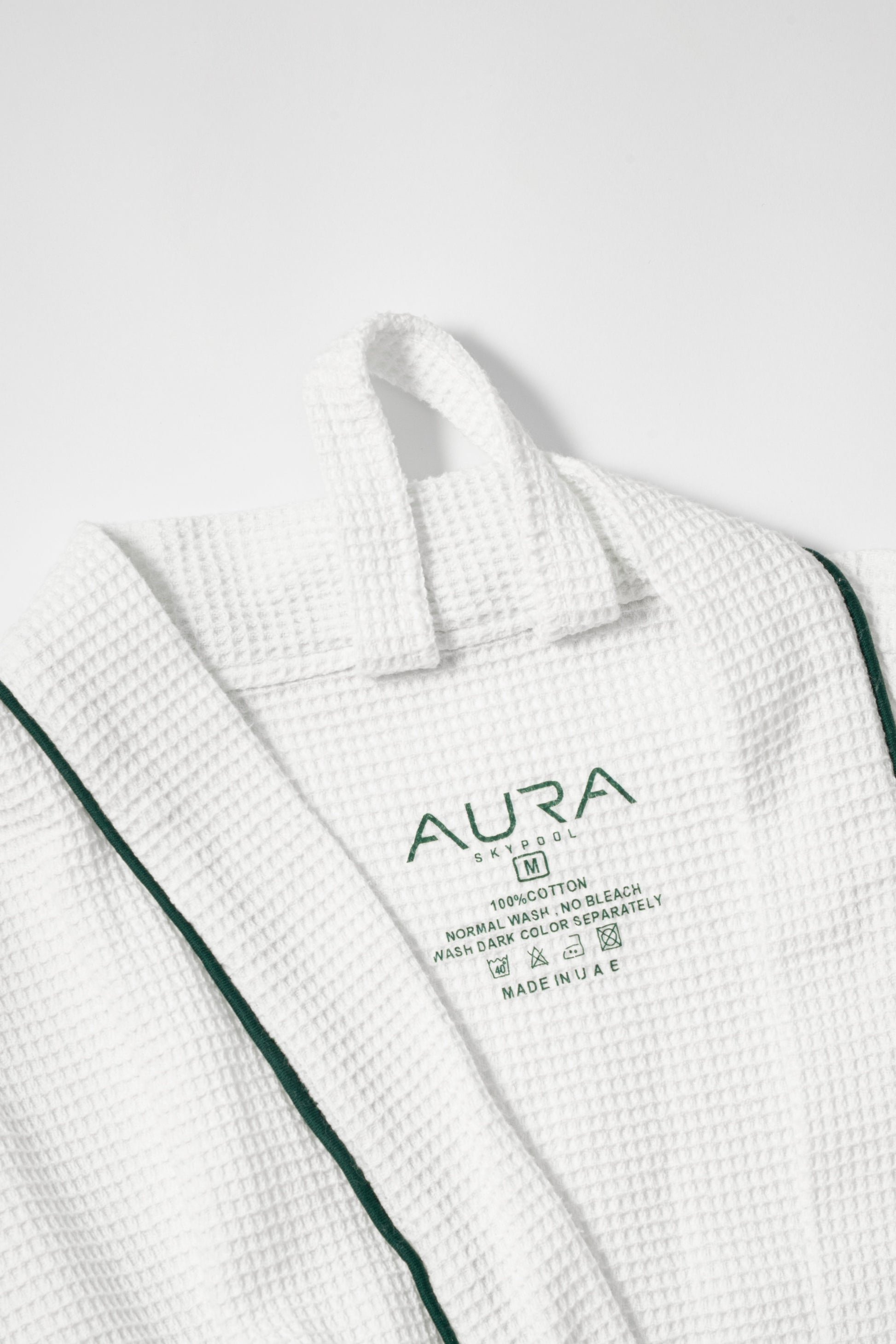 AURA Skypool care label on Waffle Robe, 100% cotton, made in UAE