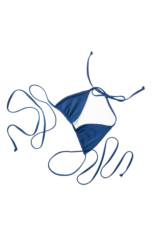 Nomad horizon blue bikini top laid flat showing long tie straps