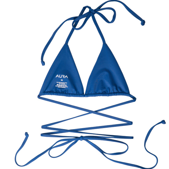 Nomad horizon blue bikini top with AURA branded neck tag visible