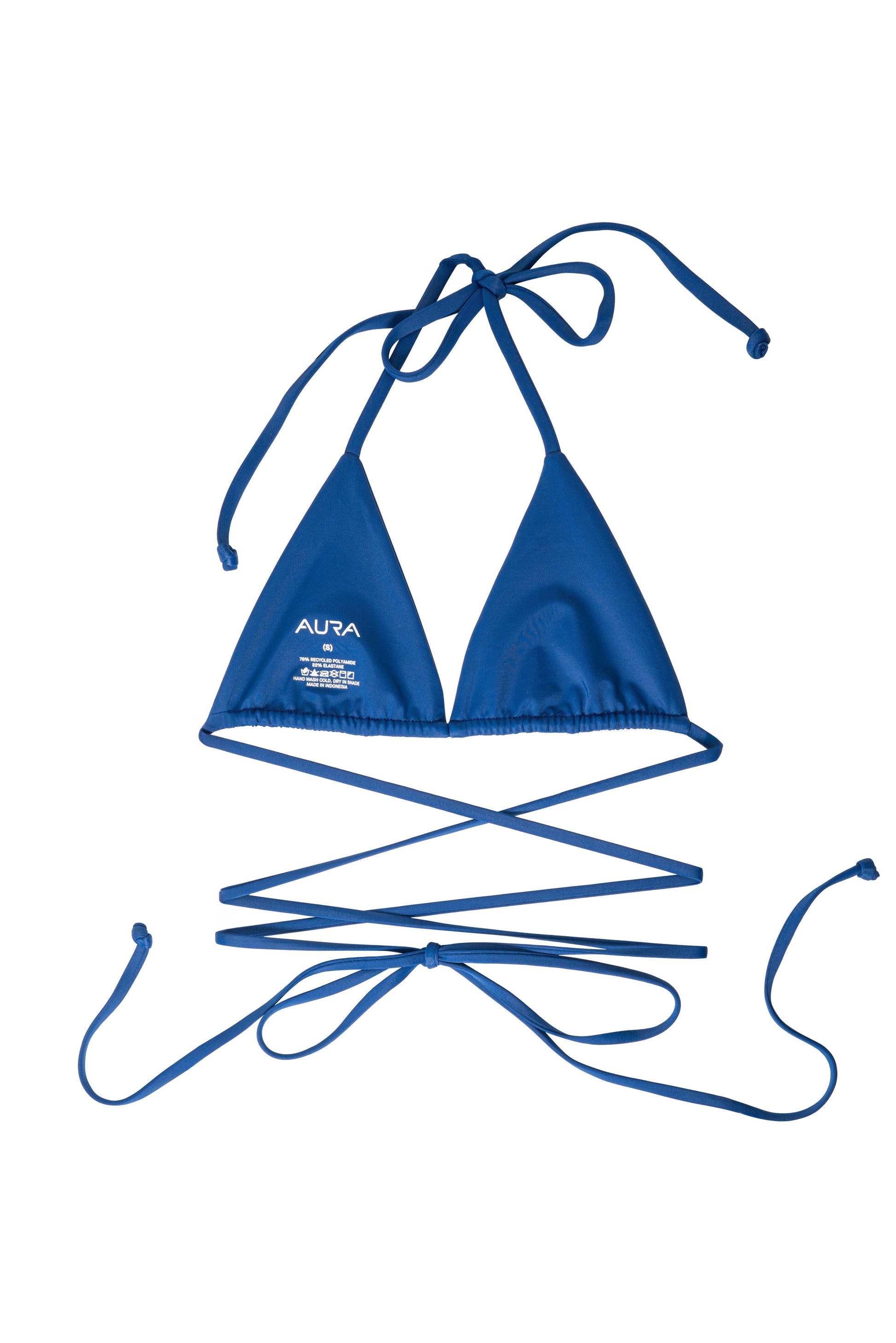 Nomad horizon blue bikini top with AURA branded neck tag visible