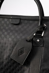 Pinnacle Duffle monogram black embossed AURA tab and matching leather luggage tag