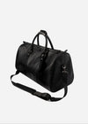 Pinnacle Duffle monogram black three-quarter view with shoulder strap
