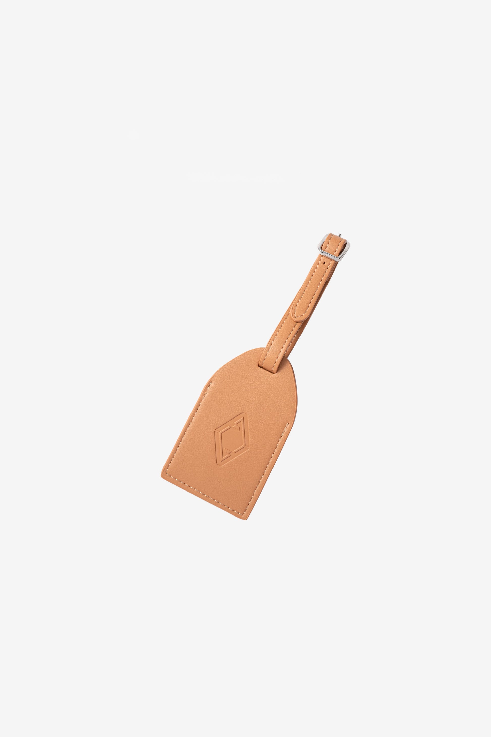AURA Luggage Tag in Clay, leather tag with embossed logo and buckle strap