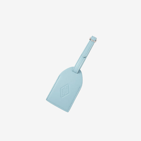 AURA Luggage Tag in Sky Blue, leather tag with embossed logo and buckle strap