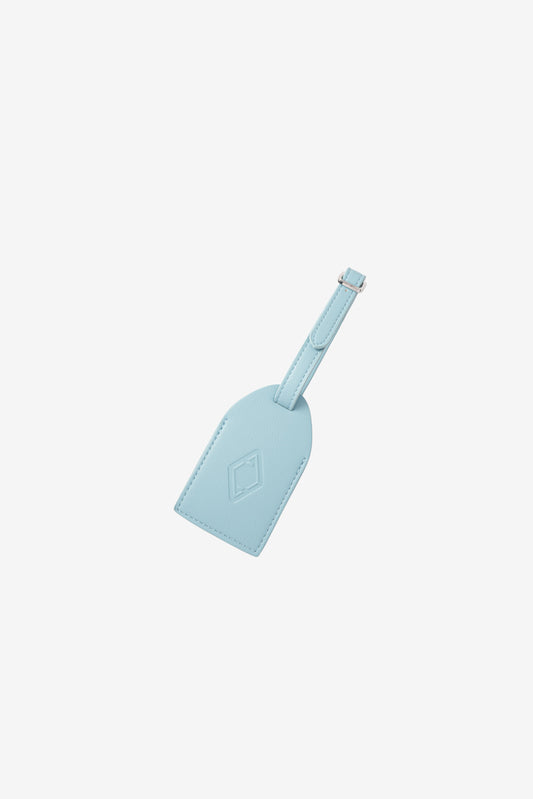 AURA Luggage Tag in Sky Blue, leather tag with embossed logo and buckle strap