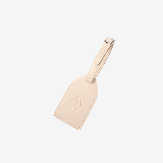 AURA Luggage Tag in Stone, leather tag with embossed logo and buckle strap