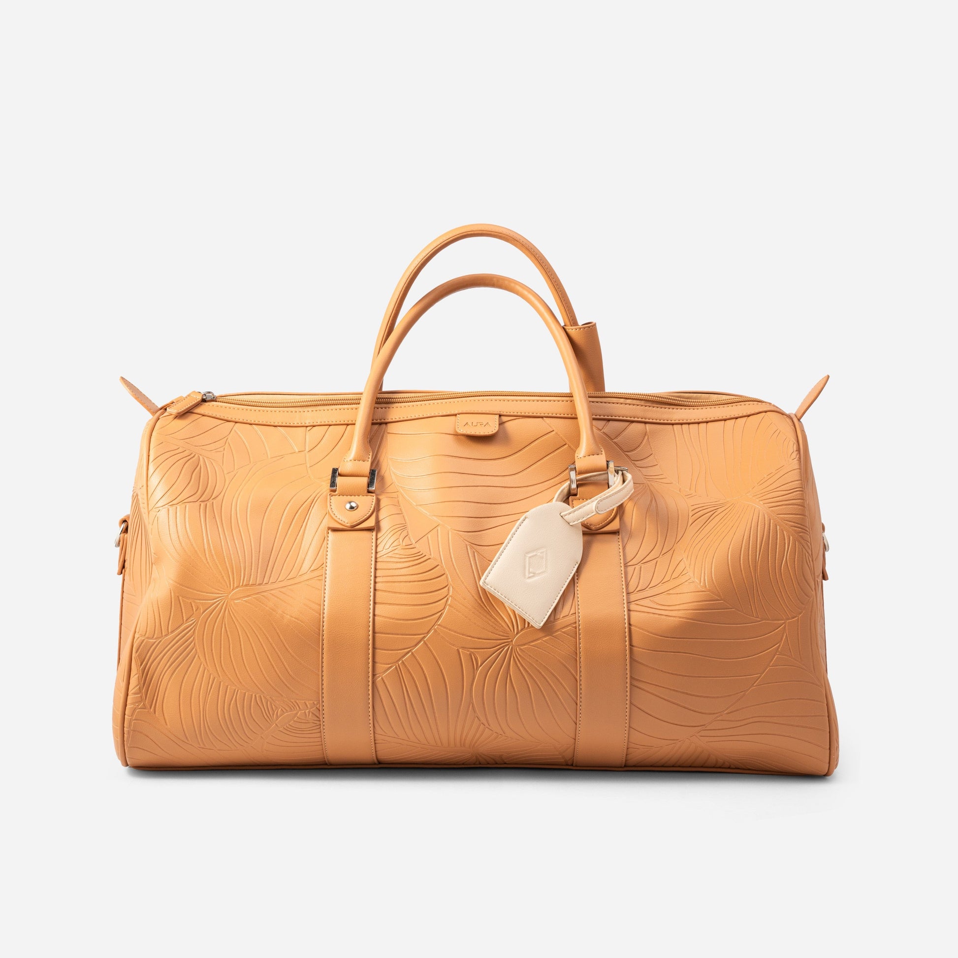Weekender Duffle clay front view showing cream leather luggage tag