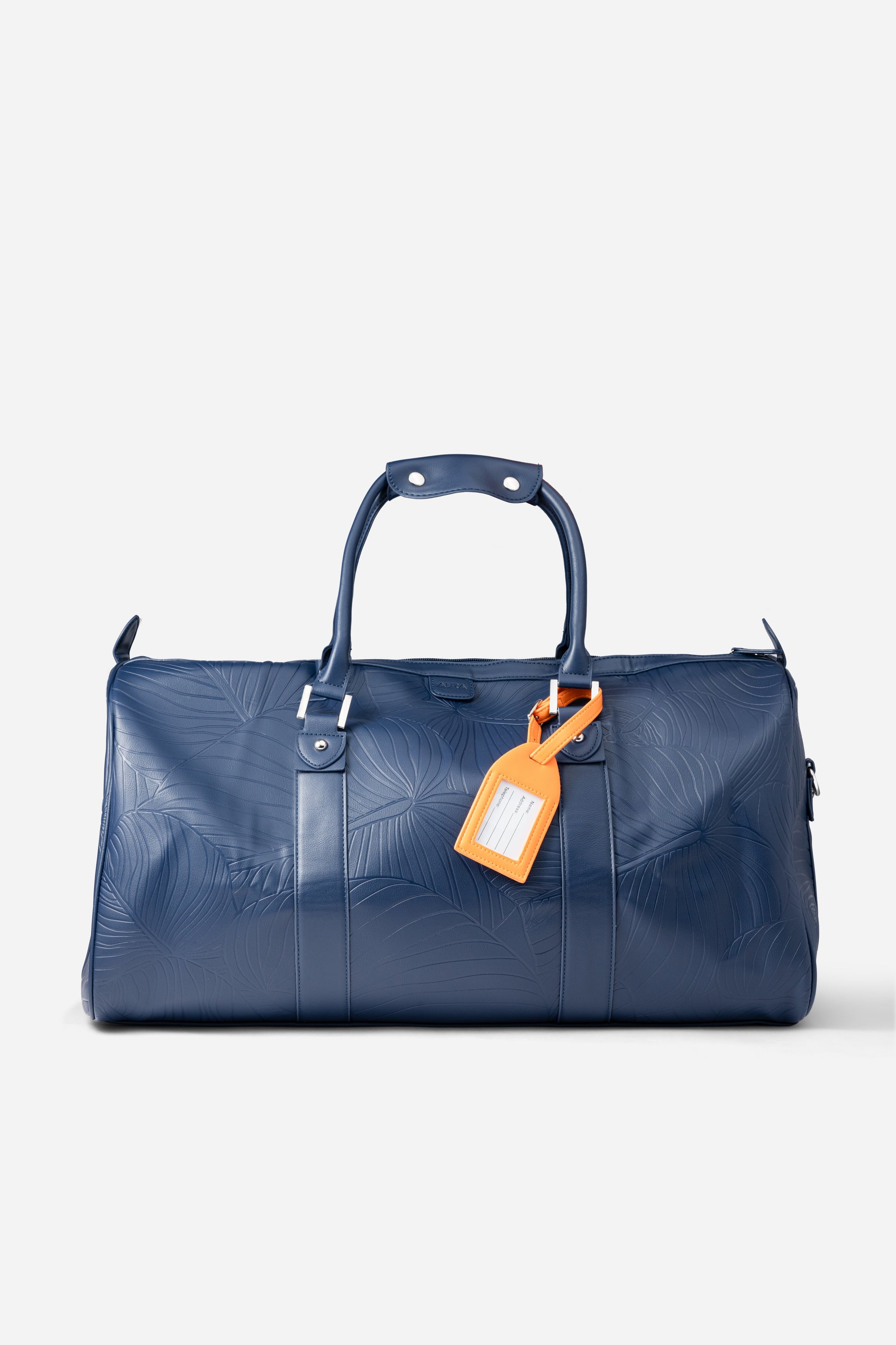 AURA Weekender Duffle in horizon blue with leaf-embossed leather and orange luggage tag