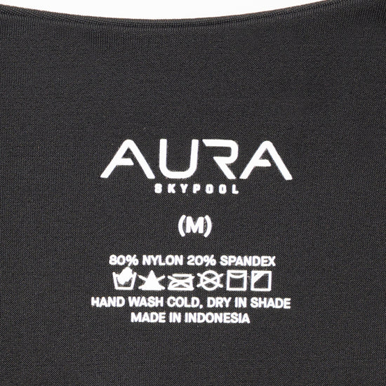 AURA Skypool care label on Sirene swimsuit, 80% nylon 20% spandex, made in Indonesia