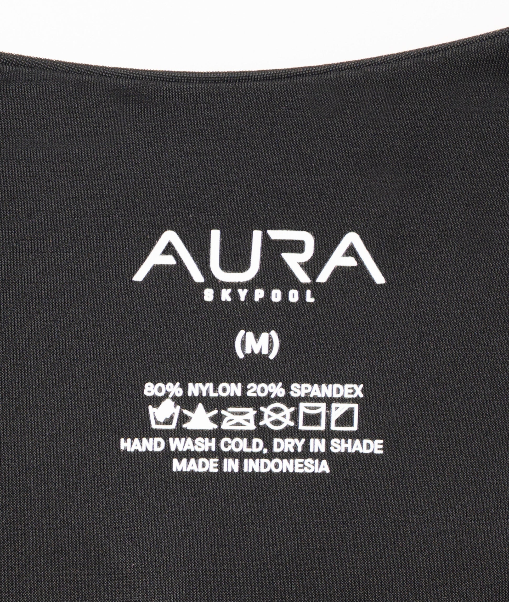 AURA Skypool care label on Sirene swimsuit, 80% nylon 20% spandex, made in Indonesia