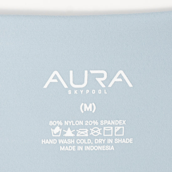 AURA Skypool care label on Solstice bikini top, 80% nylon 20% spandex, made in Indonesia