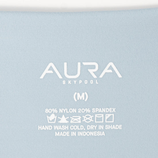 AURA Skypool care label on Solstice bikini bottom, 80% nylon 20% spandex, made in Indonesia