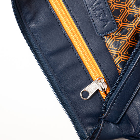 Travel Pouch in Horizon Blue, interior open with orange zip and printed lining