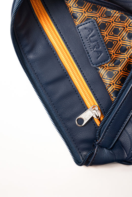Travel Pouch in Horizon Blue, interior open with orange zip and printed lining