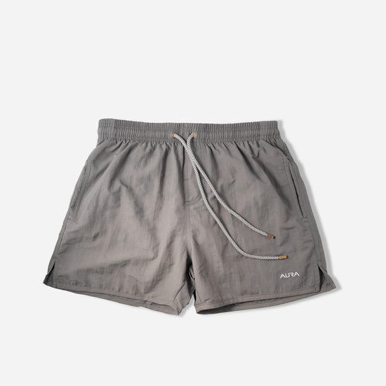 Voyager Swim Shorts in charcoal grey, front flat lay