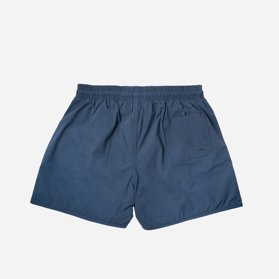 Voyager Swim Shorts in horizon blue, back flat lay with pocket detail