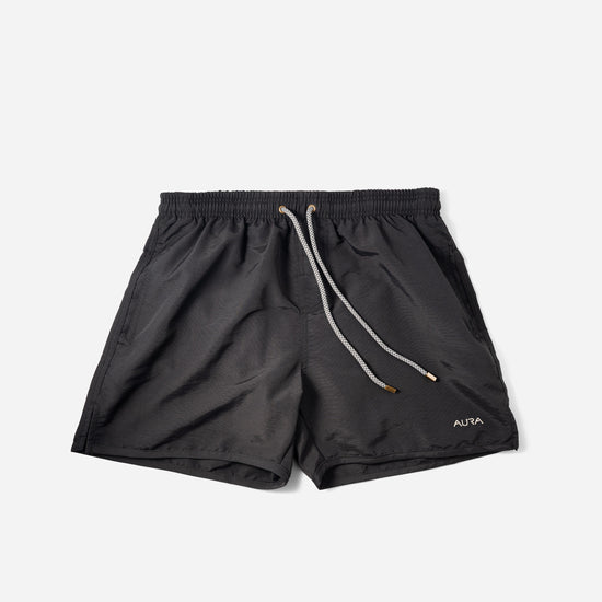 Voyager Swim Shorts in night black, front flat lay